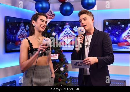 Dua Lipa wird während des ersten Tages des Capital's Jingle Bell Ball 2017 in der O2 Arena, London, interviewt. Stockfoto