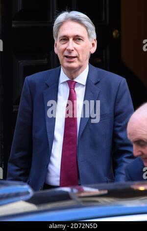 Schatzkanzler Philip Hammond verlässt 10 Downing Street, London, auf dem Weg zu den Fragen des Premierministers im parlament. Bilddatum: Mittwoch, der 14. März 2018 Bildnachweis sollte lauten: Matt Crossick/ EMPICS Entertainment. Stockfoto