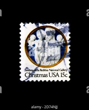 MOSKAU, RUSSLAND - 24. NOVEMBER 2017: Eine in den USA gedruckte Briefmarke zeigt Madonna mit Kind mit Cherubim, von Andrea della Robbia, Weihnachtsserie, um 1978 Stockfoto