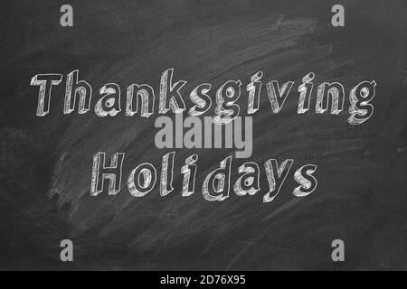 Handzeichnung Text 'Thanksgiving Holiday' auf Tafel Stockfoto