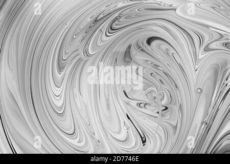 Schwarze und weiße Wellen auf grauer Verschmelzung der Farben. Fluid Art. Abstrakter Marmorhintergrund oder Textur Stockfoto