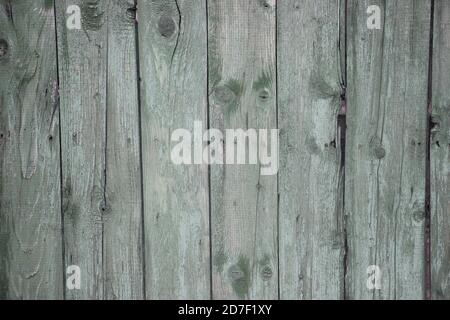 Alte verwitterte Holzplanken in Teal vor langer Zeit gemalt. Textur Hintergrund Stockfoto