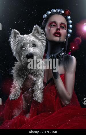 Surreal Foto von einer Hexe Mädchen mit schwarzen Augen und Dämonenhund in ihren Händen Stockfoto