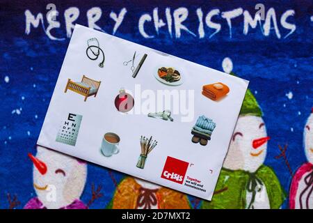 Post on Christmas mat - Charity-Appell, Krise gemeinsam werden wir Obdachlosigkeit beenden Stockfoto