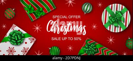 weihnachtsbanner mit Geschenkschachteln und weihnachtskugeln Stock Vektor