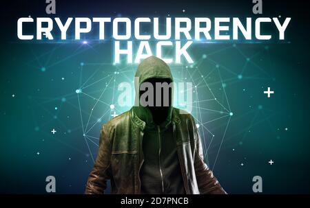 Geheimnisvoller Hacker mit KRYPTOWÄHRUNG HACK Inschrift, Online-Angriff Konzept Inschrift, Online-Sicherheit Konzept Stockfoto