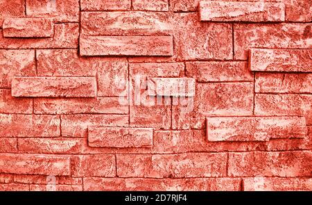 Getönte Koralle Farbe Backstein Wand Textur Grunge Hintergrund. Platz für Ihr Design. Stockfoto