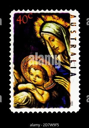 MOSKAU, RUSSLAND - 28. MÄRZ 2018: Eine in Australien gedruckte Briefmarke zeigt Weihnachten - Madonna mit Kind, Serie, um 1995 Stockfoto