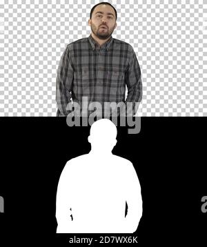 Junger Mann, der läuft und pfeift, Alpha Channel Stockfoto