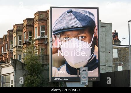 Uber - No Mask, No Ride Werbung in Wandsworth, Southwest London, UK Stockfoto