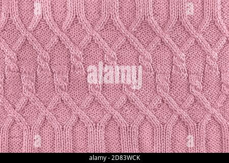 Strickstruktur in rosa Farbe. Nahaufnahme. Stockfoto