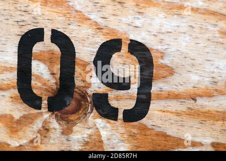 Schwarze Nummer neun auf Holzstruktur gestempelt Stockfoto