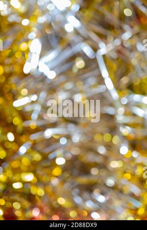 Abstrakt verschwommener Hintergrund von schönen goldenen Bokeh. Stockfoto