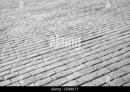 Boden einer Straße mit Steinfliesen. Stockfoto