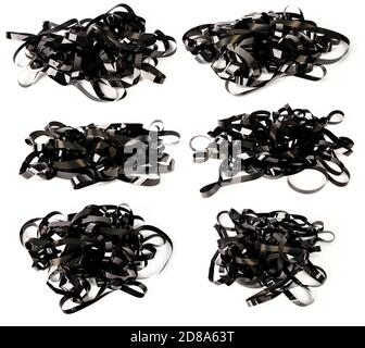 Sammlung von Bildern mit Haufen von Videobändern isoliert auf weißem Hintergrund. Magnetische Videobänder. Stockfoto