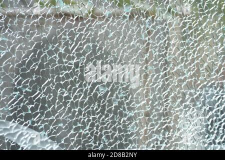 Zerbrochenes gehärtetes Glas. Zerbrochene Glasstruktur. Stockfoto