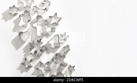 Weihnachtliche Ausstechformen für hausgemachte Lebkuchen mit Schatten. Weihnachtskarte. Draufsicht und flache Lage. Speicherplatz kopieren. Stockfoto