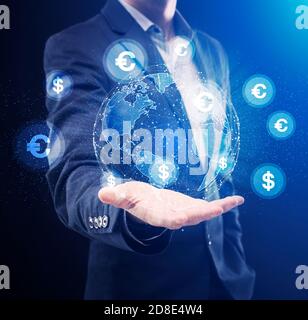 Weltwirtschaft in der Hand des Geschäftsmannes der großen Firma Stockfoto