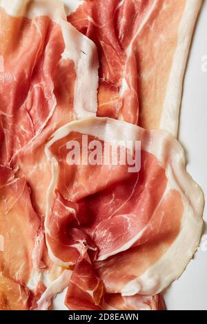 Prosciutto-Scheiben Stockfoto