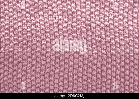 Strickstruktur in rosa Farbe. Nahaufnahme. Stockfoto