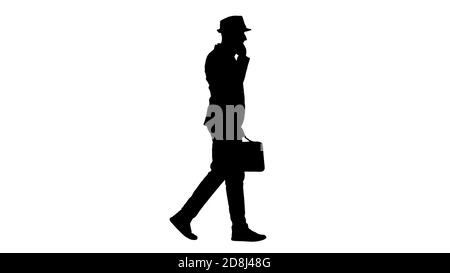 Silhouette arabischer Mann in Casual Walking und einen Anruf. Stockfoto