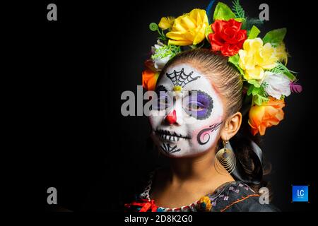 Mädchen personifiziert als catrina Stockfoto