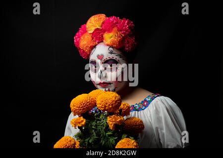 Mädchen personifiziert als catrina Stockfoto