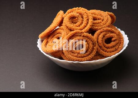 Indische traditionelle Tea Time Snack Chakli, ein frittierter Snack, Es ist als Chakali, Murukku, Muruku, Murkoo, Chakri bekannt. Stockfoto