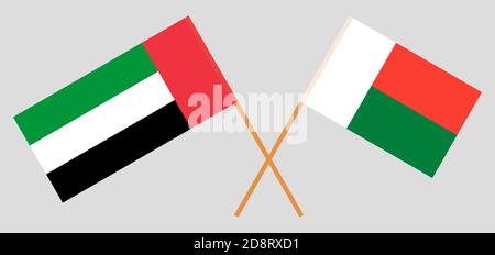 Gekreuzte Flaggen von Madagaskar und den Vereinigten Arabischen Emiraten. Offizielle Farben. Korrektes Verhältnis. Vektorgrafik Stock Vektor