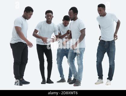 Im vollen Wachstum. Eine Gruppe von tanzenden Jungs in den weißen T-Shirts Stockfoto