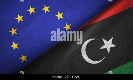 Europäische Union und Libyen zwei Flaggen Textiltuch, Stoff Textur Stockfoto