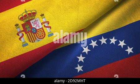 Spanien und Venezuela zwei Flaggen Textiltuch, Stoff Textur Stockfoto