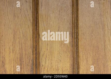 Textur von lackierten Holzplanken in braun lackiert. Stockfoto