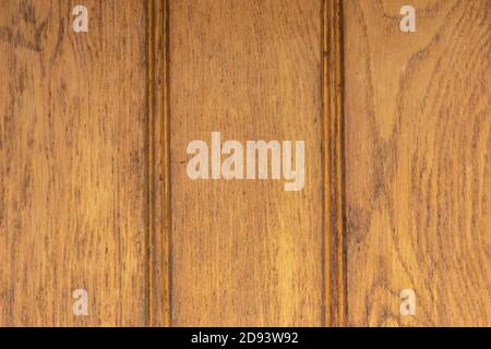 Textur von lackierten Holzplanken in braun lackiert. Stockfoto