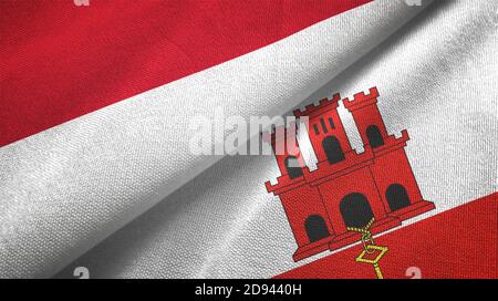 Indonesien und Gibraltar zwei Flaggen Textiltuch, Stoffstruktur Stockfoto
