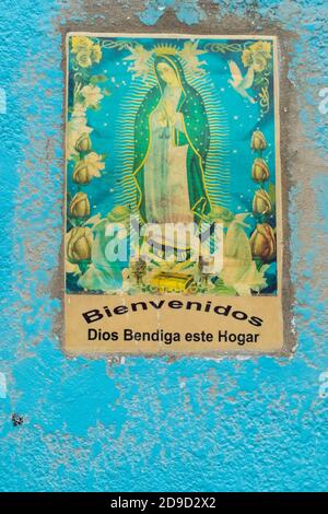 Religiöse Malerei an der Wand eines Hauses, Merira, Mexiko Stockfoto