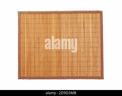 Eine Bambusluncheon-Matte auf weißem Hintergrund. Ein Blick von oben Stockfoto