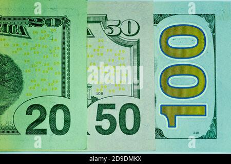 Nahaufnahme von zwanzig, fünfzig und hundert US-Dollar-Scheinen Stockfoto