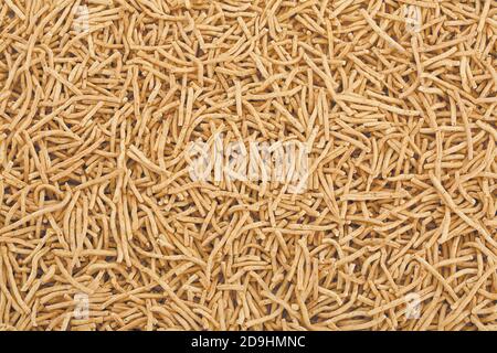 Ratlami Sev, Bhujia, gebraten und würzig, Snacks von Kichererbsen mit Punsch von Nelke, Indian Pouch Packing Street Snack Food. - Bild Stockfoto