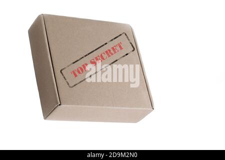 Stempel oben Geheimnis auf braunem Karton isoliert auf weißem Hintergrund. Formularbox für persönliche Informationen mit vertraulicher Prägung Stockfoto