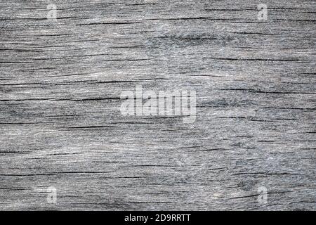 Verwitterte Sperrholzstruktur mit Rissen und Flecken Stockfoto