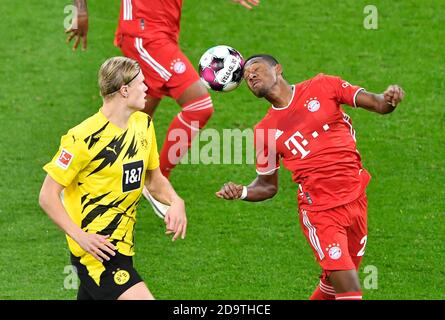 Dortmund, Deutschland. November 2020. David ALABA, FCB 27 Wettkampf um den Ball, Tackling, Duell, Header, zweikampf, Action, Kampf gegen Erling HAALAND , BVB 17 Beim Spiel BORUSSIA DORTMUND - FC BAYERN MÜNCHEN in der 1. Deutschen Bundesliga, Saison 2020/2021, Spieltag 7, Dortmund, Deutschland, 7. November 2020. © Peter Schatz / Alamy Live News / E.Kremser/SVEN SIMON/Pool wichtig: Die DFL-VORSCHRIFTEN VERBIETEN DIE VERWENDUNG VON FOTOGRAFIEN als BILDSEQUENZEN und/oder QUASI-VIDEO - Nationale und internationale Nachrichtenagenturen OUT redaktionelle Verwendung KREDIT: Peter Schatz/Alamy Live News Stockfoto