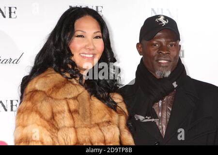 Kimora Lee Simmons und Djimon Hounsou besuchen am 15. Dezember 2009 die Premiere von "NINE" im Ziegfeld Theater in New York City. Foto: Henry McGee/MediaPunch Stockfoto