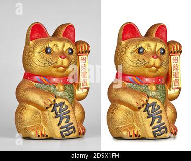 Lucky Cat, Maneki Neko winkende Arm für Glück Geld und Viel Glück. Eine isoliert auf weiß Stockfoto