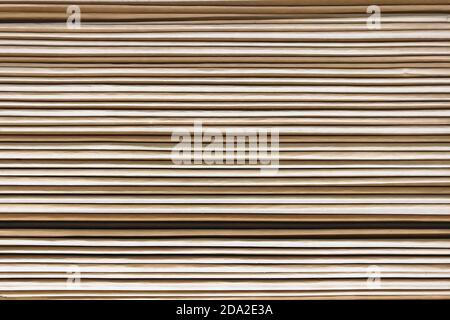Textur in Form eines Stapels aus Karton beige Stockfoto