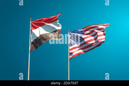 Schöne Nationalstaaten Flaggen von Jemen und USA zusammen am Himmel Hintergrund. 3D-Artwork-Konzept. Stockfoto