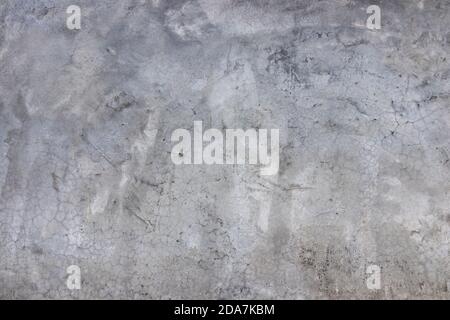 Textur der grauen Wand, Beton poliert Hintergrund. Schöne Zement verputzte Wand. Stockfoto