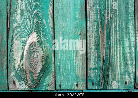 Alte Holzbretter. Die Textur von Holzbrettern mit grüner Farbe bedeckt. Stockfoto