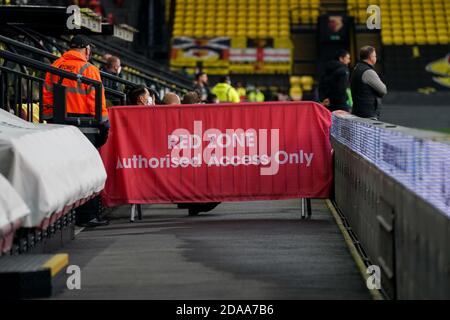 Covid-19 hat nur autorisierten Zugriff auf Red Zones vorgesehen Bereiche am Watford Football Club Vicarage Road Stockfoto