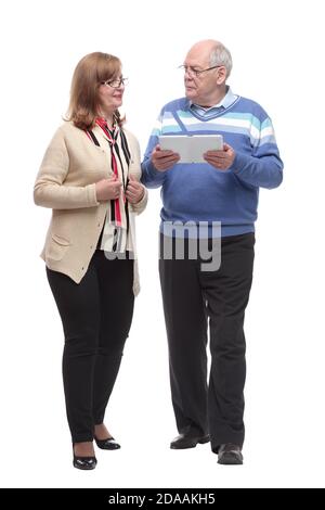 In vollem Wachstum. Casual Mann und Frau mit einem digitalen Tablet Stockfoto